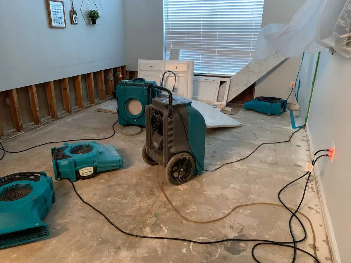 Dehumidifier in flood-cut room for Water Damage Restoration in Morton